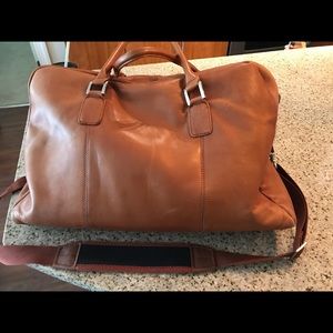 Gently used Wilson leather duffel bag
